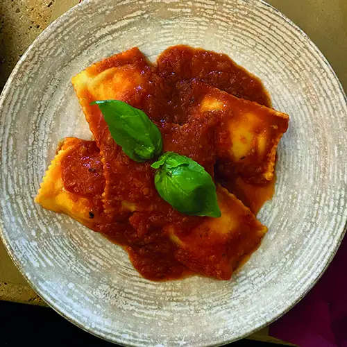 Gratin de ravioles tomate de Savoie et bacon